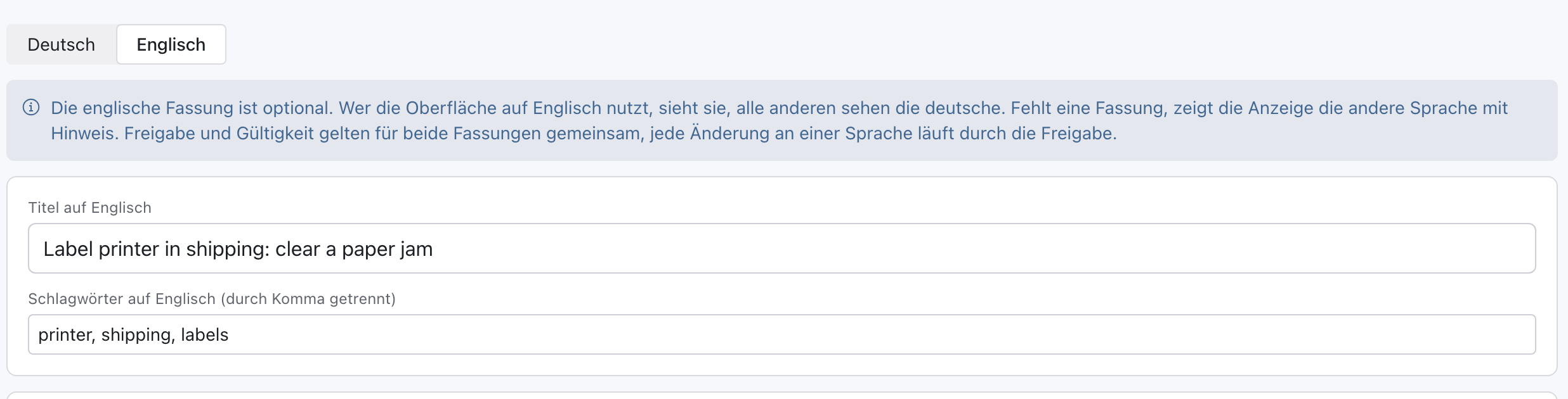 Veröffentlichter Artikel in der Ansicht Englisch mit Titel auf Englisch Label printer in shipping: clear a paper jam, Schlagwörtern und Text, ohne den Hinweis Englische Fassung fehlt
